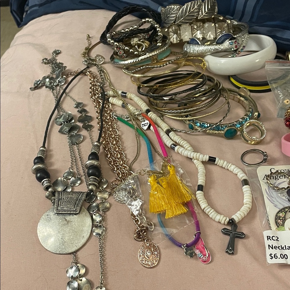 Random jewelry lots of rings necklaces and bracelets. All wearable